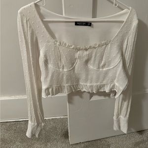 Cropped, bustier style long sleeve